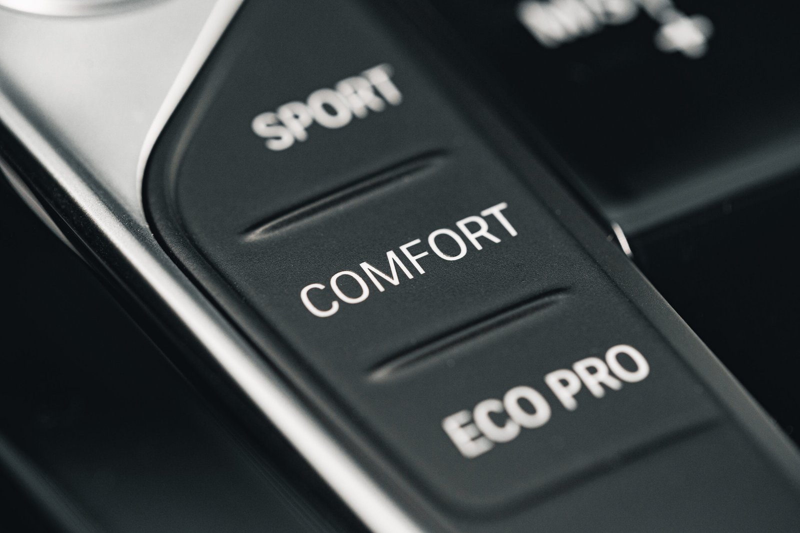 Sport and comfort driving mode buttons representing the shift from investing for retirement to investing during retirement